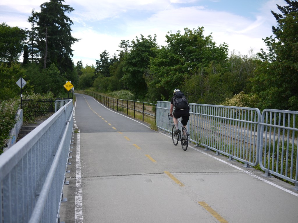 Photo of a flat asphalt bit of the Galloping Goose trail